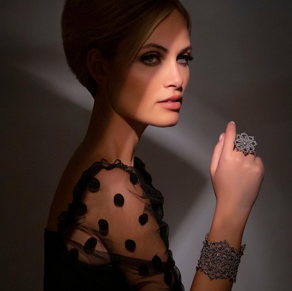 Woman wearing Ariadne lace bracelet & Rosette lace ring
