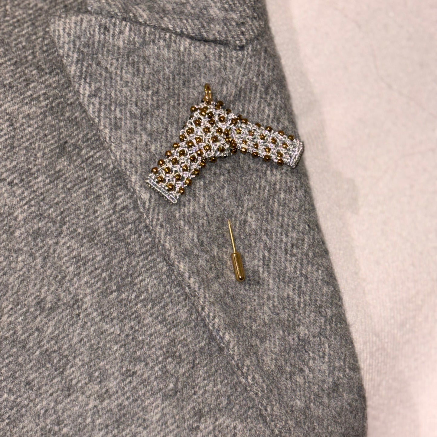Japanese Knot hand~laced brooch being worn