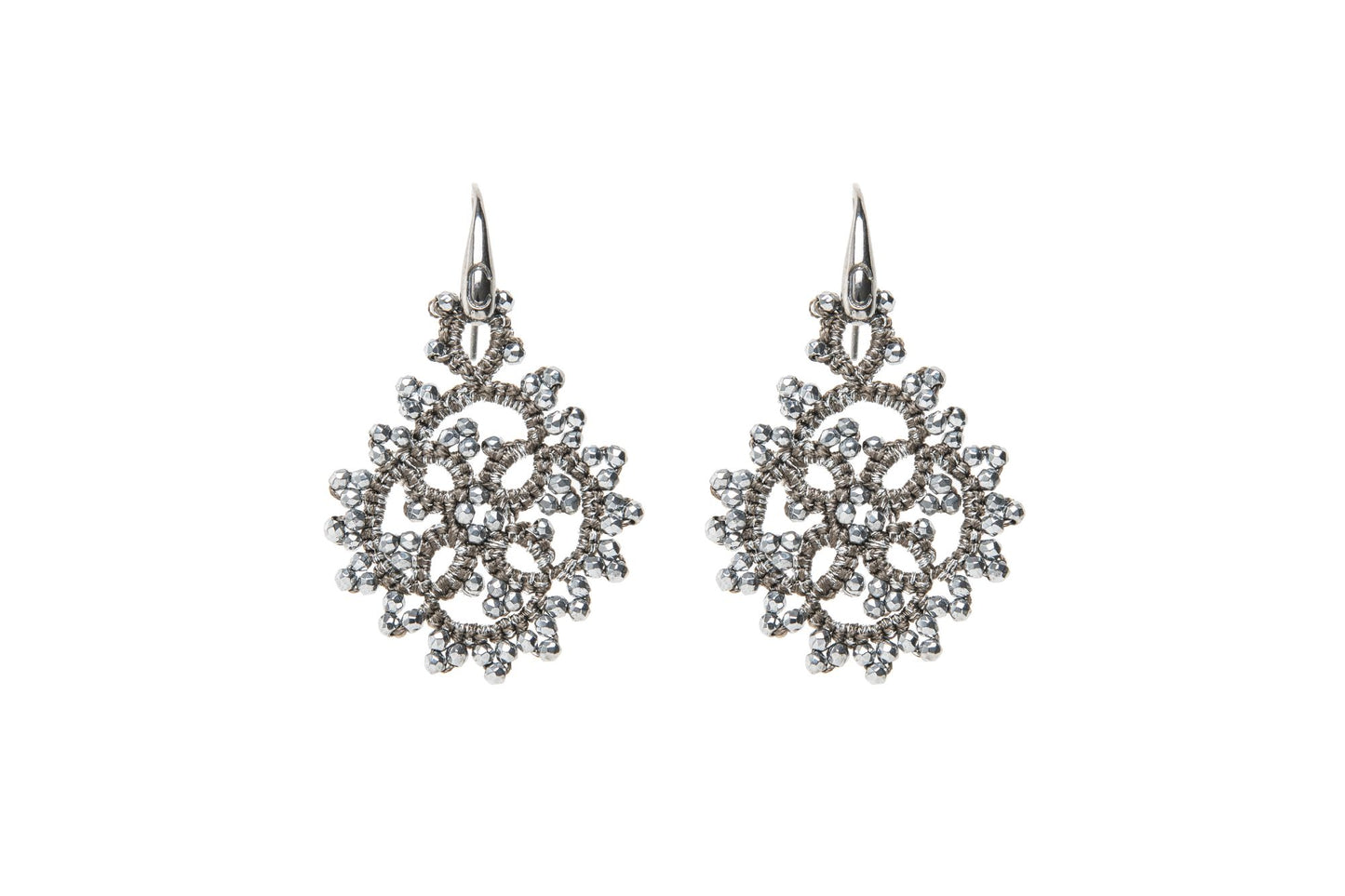 Eugenie handcrafted lace earrings grieve silver on white backround