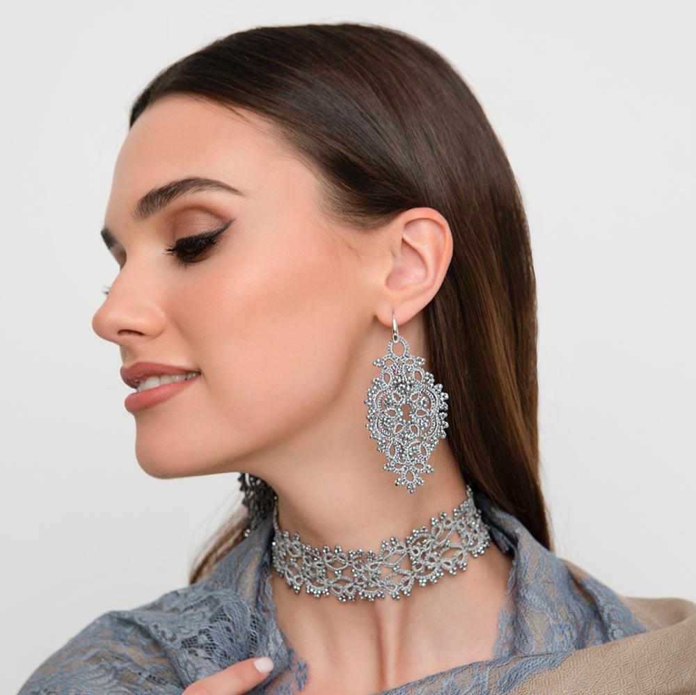 Alexandra handcrafted gemstone lace earrings being worn