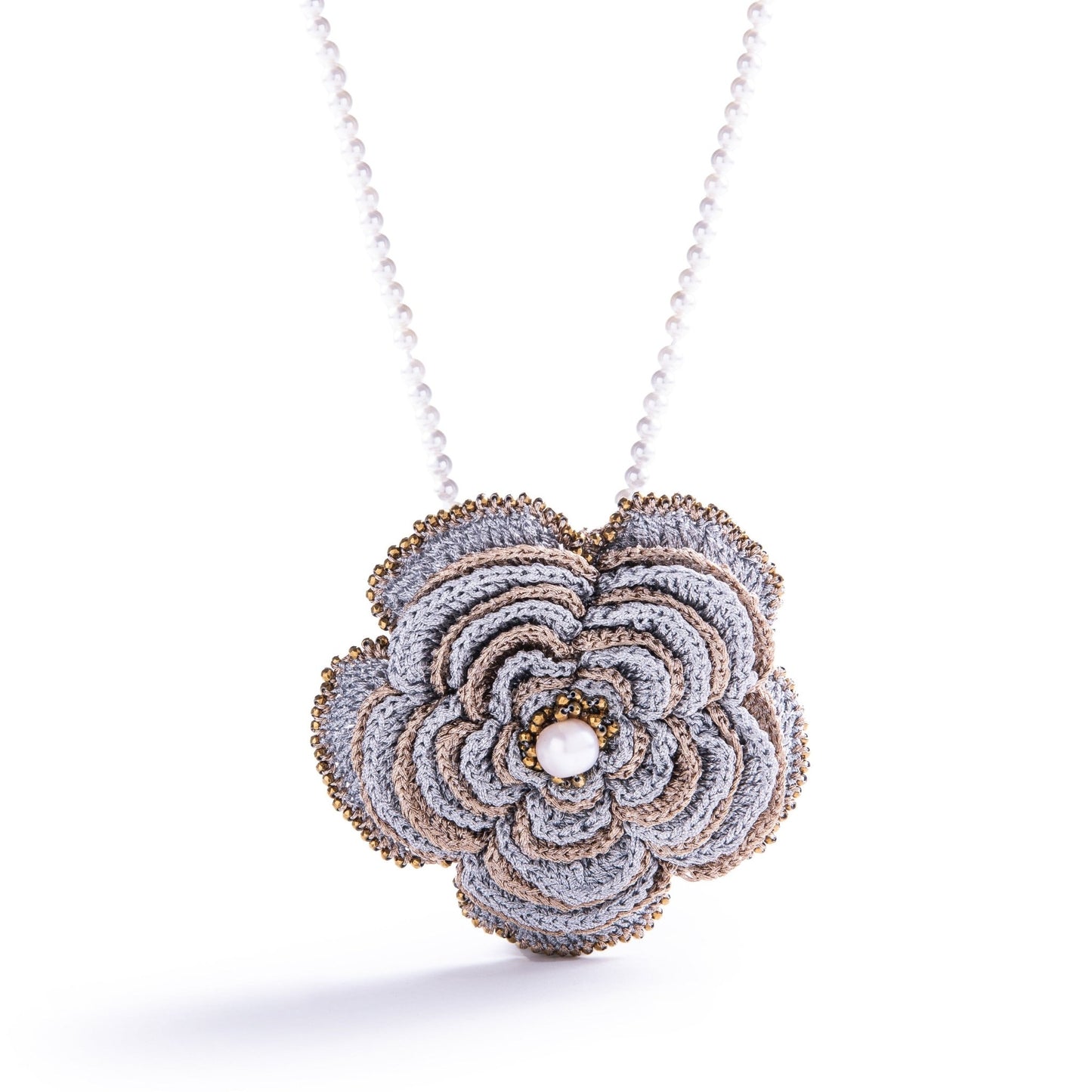 Hand-crocheted Camelia brooch, gold pendant