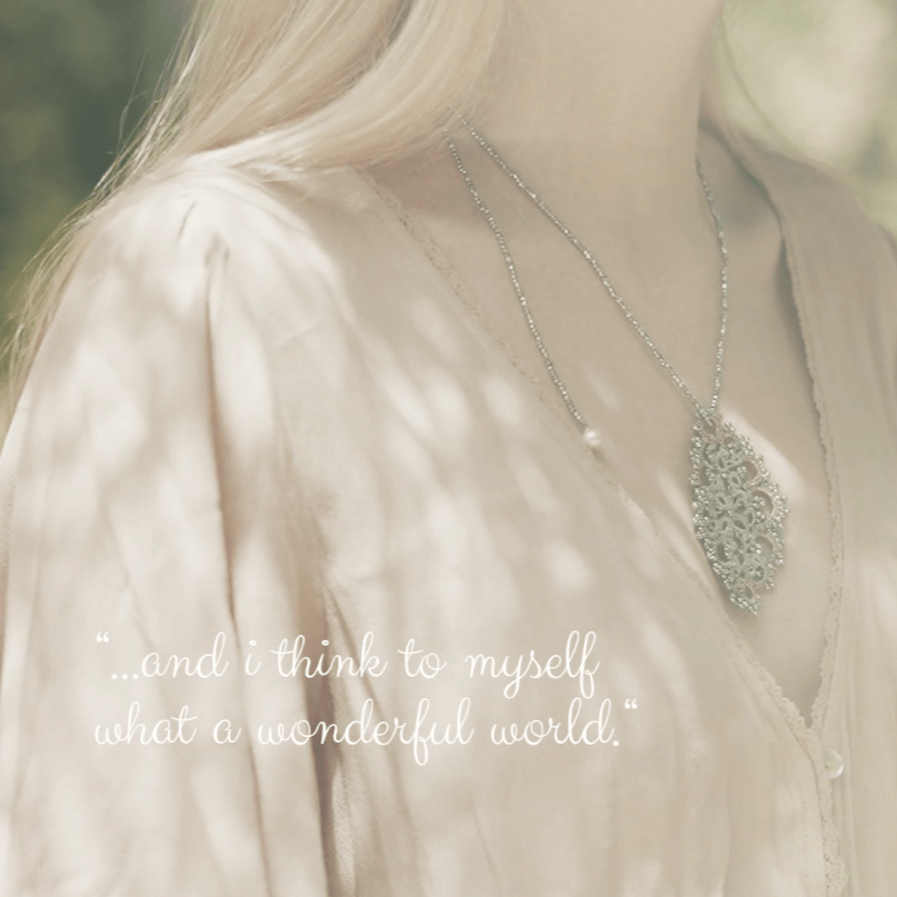 Diana handcrafted gemstone lace pendant being worn