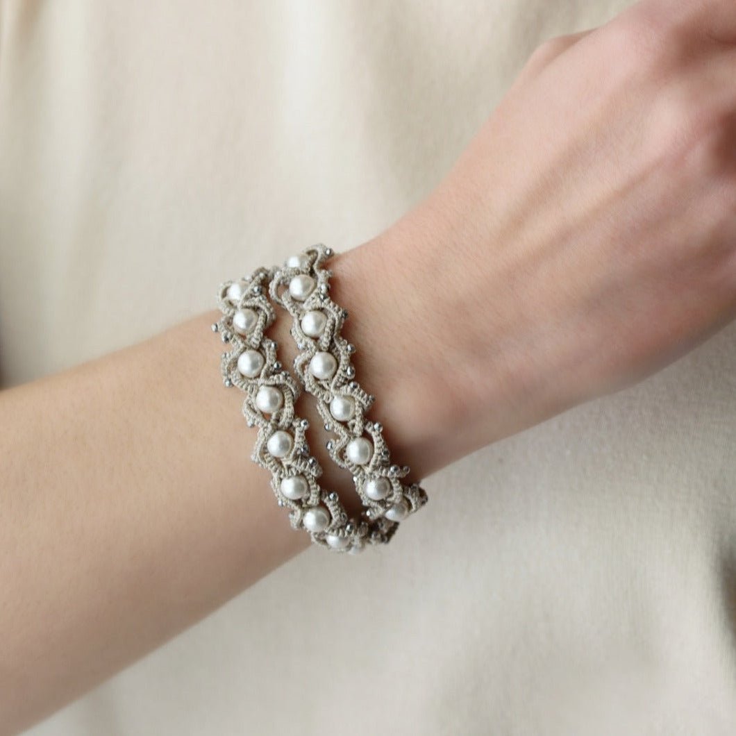 Ocean chic handcrafted gemstone lace bracelet being worn