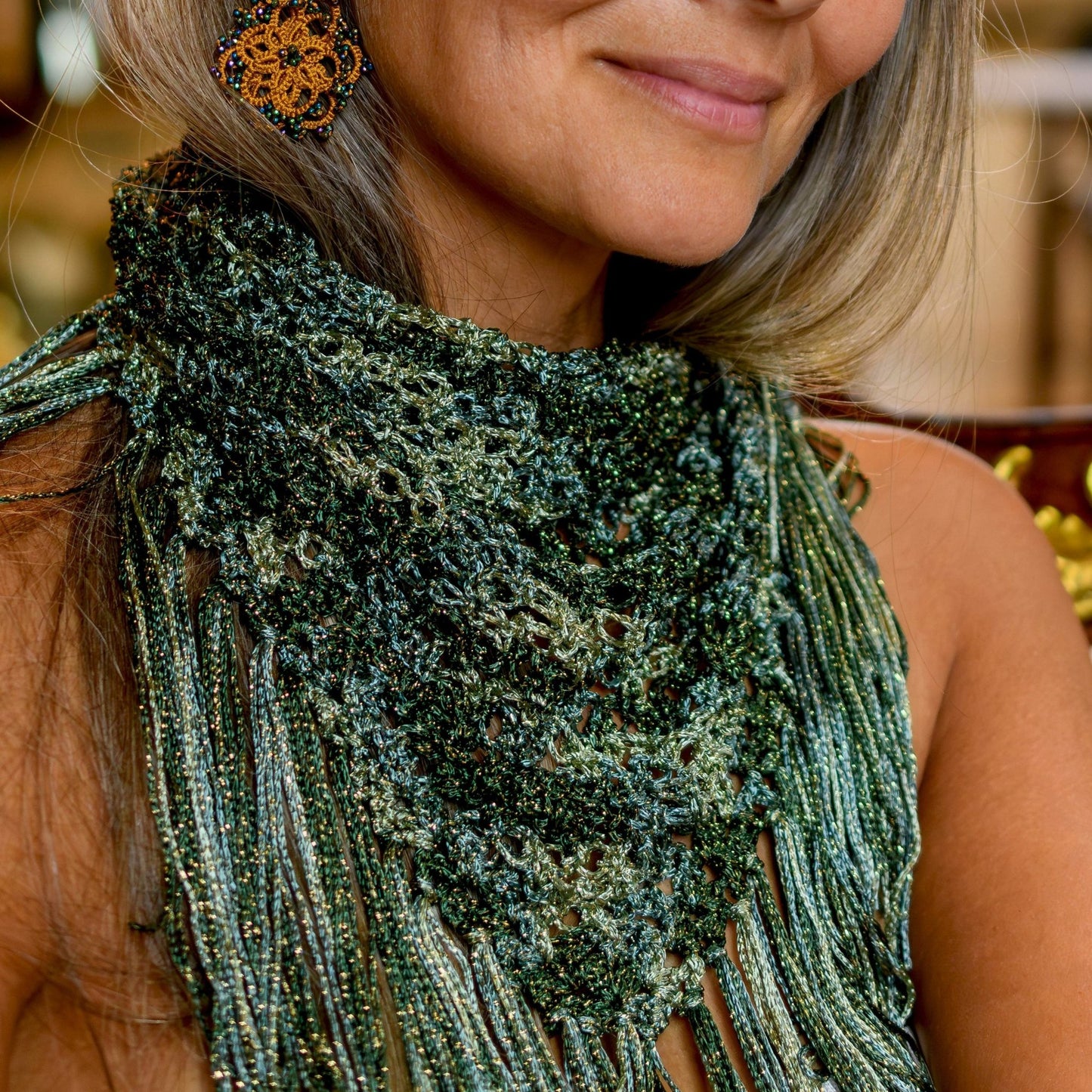 View of hand-crocheted scarf/neck accessory olivegold