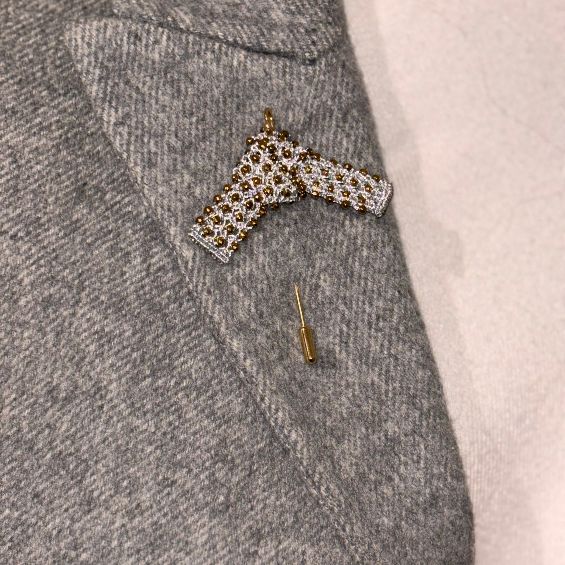 Japanese Knot hand~laced brooch being worn