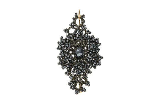 Callista handcrafted lace brooch on a white backround
