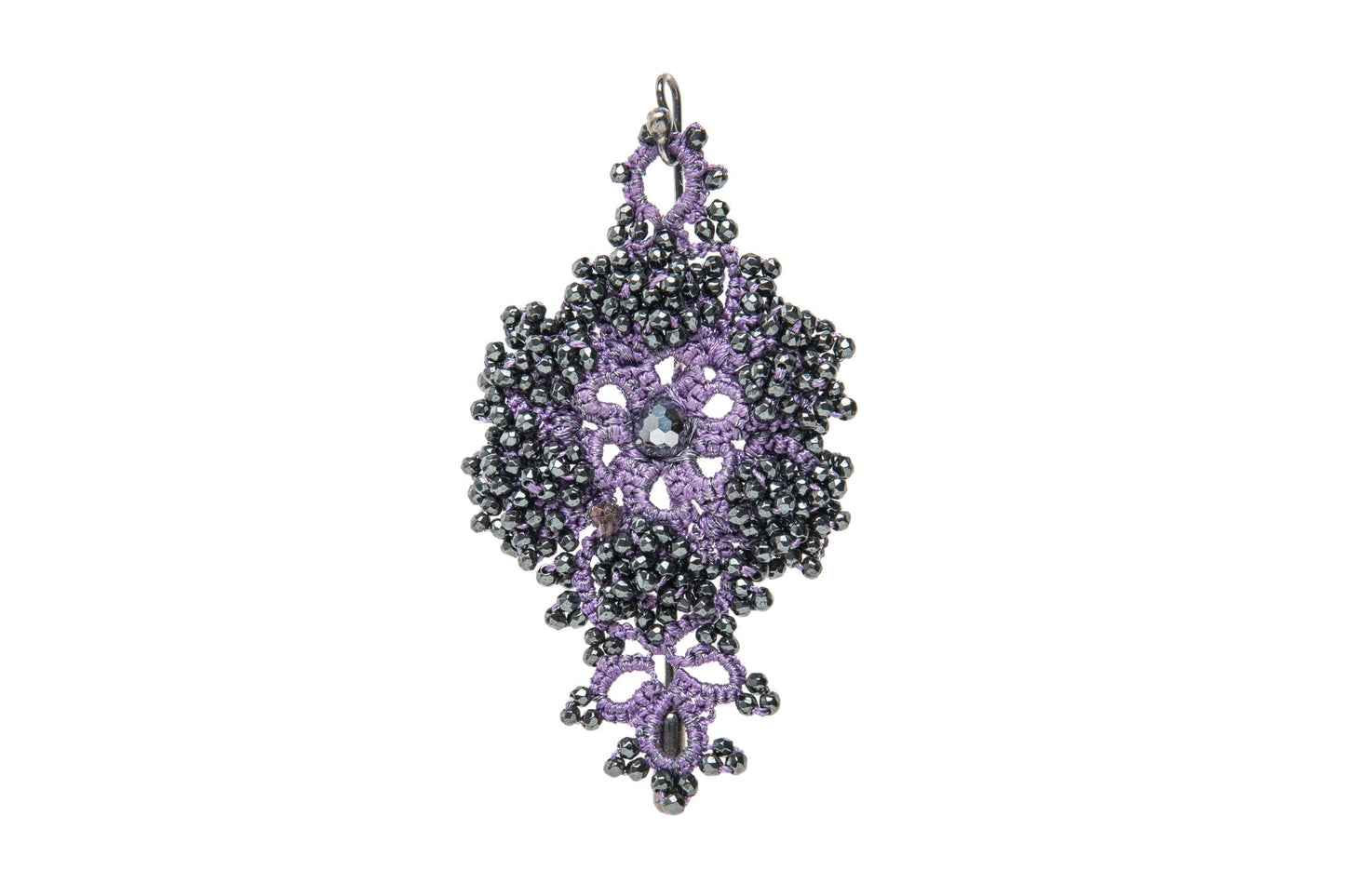 Callista handcrafted lace brooch purple  on a white background