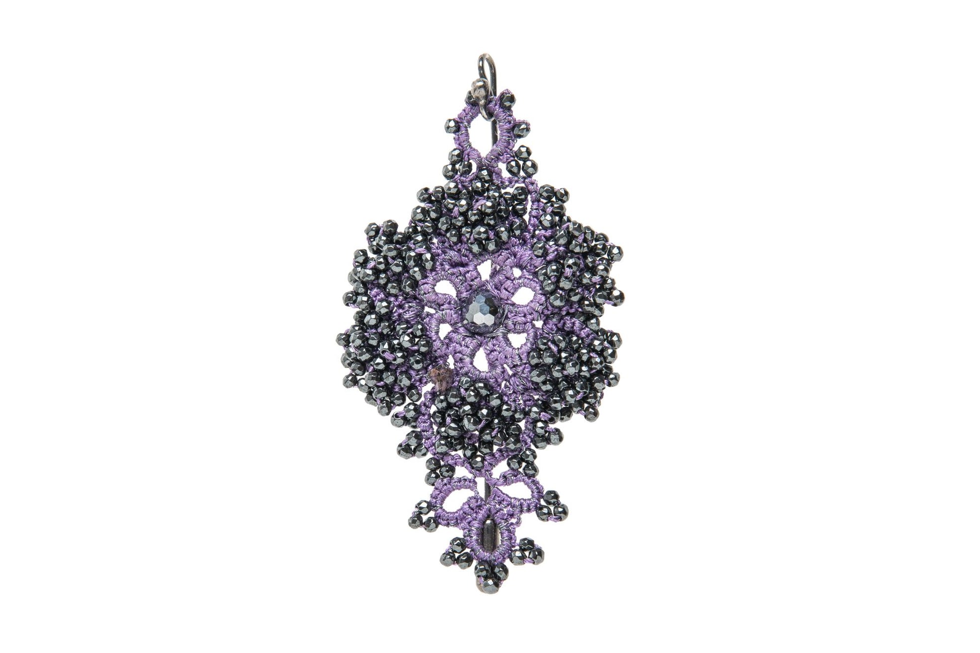 Callista handcrafted lace brooch purple  on a white background