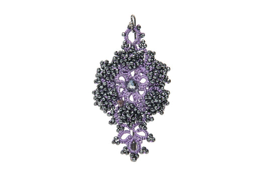 Callista handcrafted lace brooch purple  on a white background