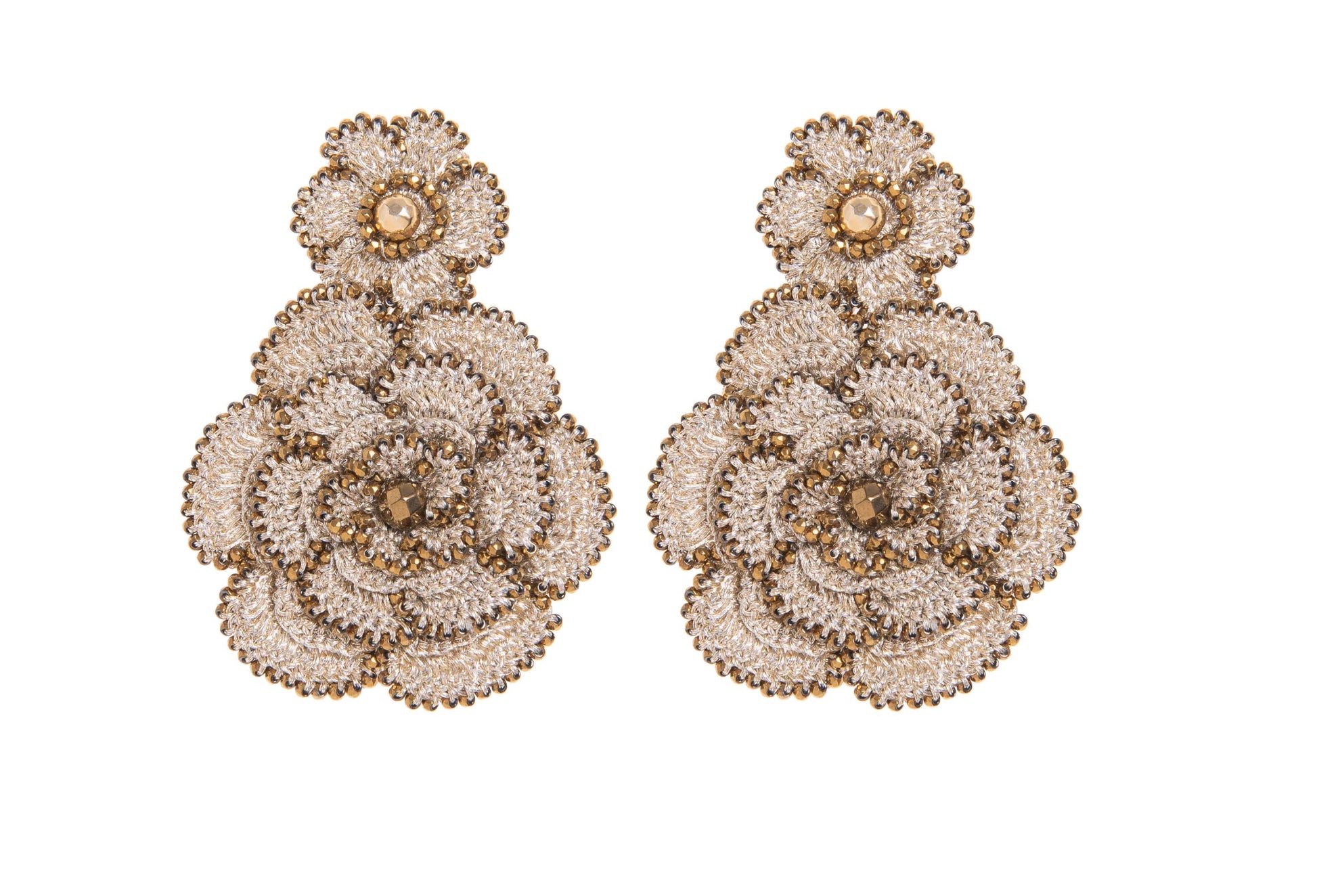 Pair of floral hand~crocheted earrings design on a white background