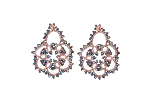Flower handcrafted lace earrings on white backround