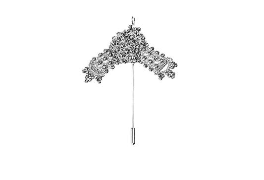 Japanese Bow handcrafted lace brooch on a white background