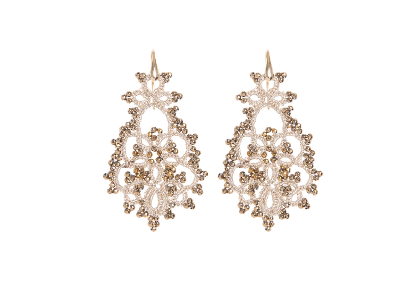 Pair of gold lace earrings on a white background