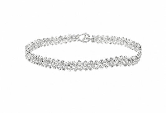 Tennis handcrafted lace silver choker with gemstones on a white background